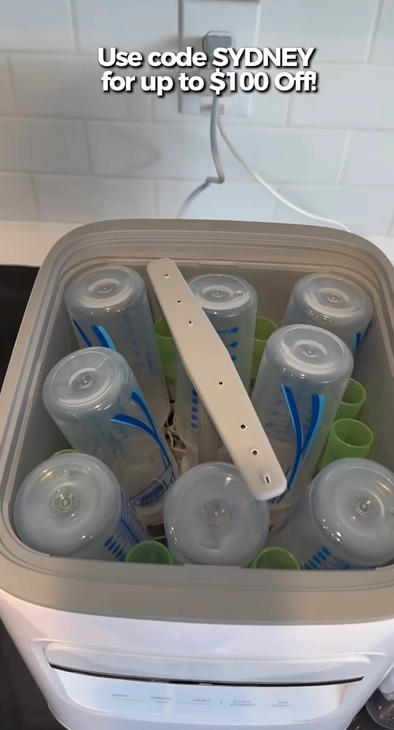 photo of 8 bottles in the bottle washer